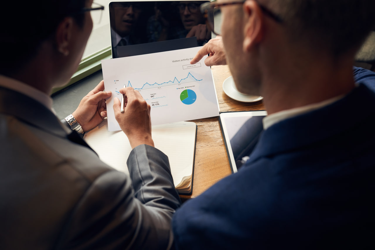 investors reviewing project viability and financial risk analysis for sustainable development